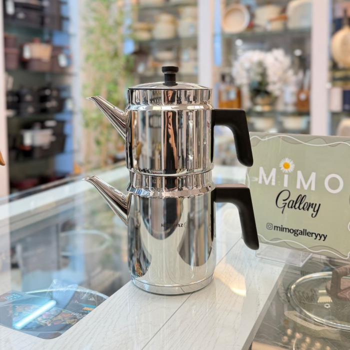 کتری قوری استیل کرکماز مدل استوانه ای براق با قپه و دسته مشکی ه